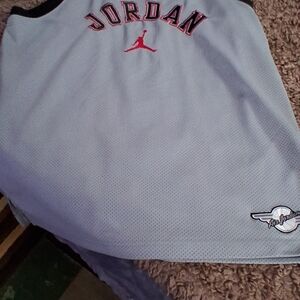 Jordan Light Blue Jersey with Red Accents